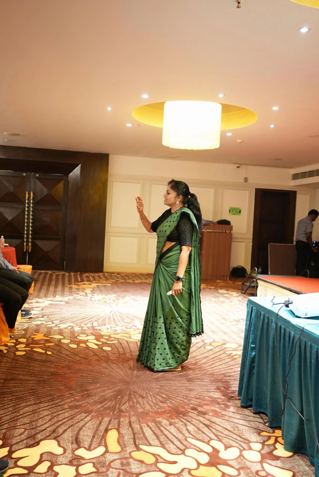 Subhavahini Seetharaman speaking on stage